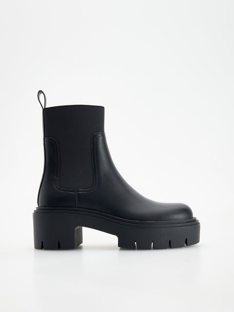 Reserved Women's Black Ankle Boots With A Tractor Sole | Reserved In Lebanon