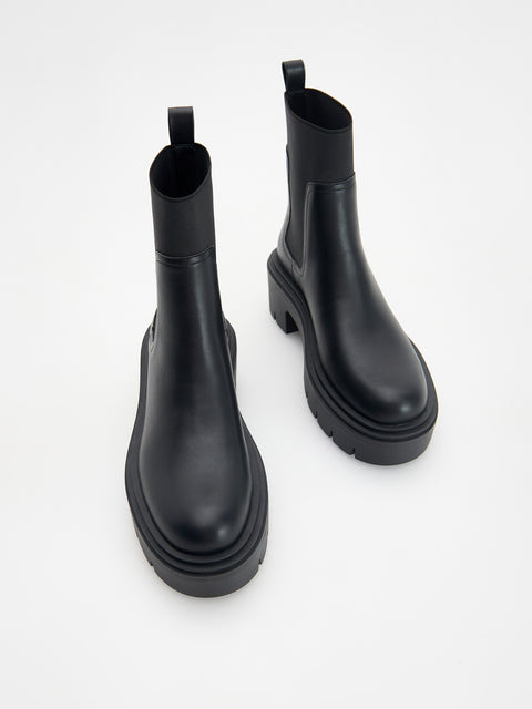 Reserved Women's Black Ankle Boots With A Tractor Sole | Reserved In Lebanon