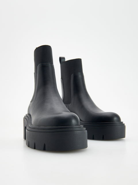 Reserved Women's Black Ankle Boots With A Tractor Sole | Reserved In Lebanon