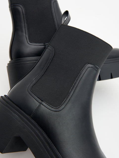 Reserved Women's Black Ankle Boots With A Tractor Sole | Reserved In Lebanon
