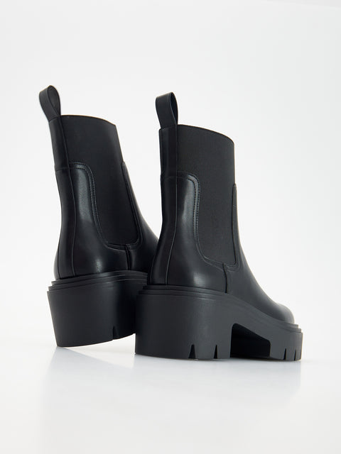 Reserved Women's Black Ankle Boots With A Tractor Sole | Reserved In Lebanon