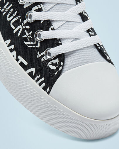 Converse Unisex Chuck Taylor styling meets bold Black, White & Orange Sneakers | Converse In Lebanon