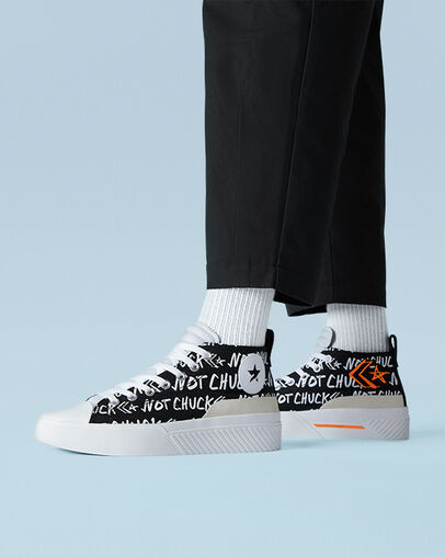 Converse Unisex Chuck Taylor styling meets bold Black, White & Orange Sneakers | Converse In Lebanon