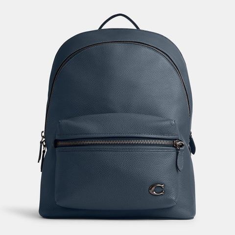 Blue backpack with a visible brand logo on a light gray background