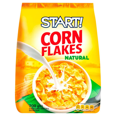 Bag of Start! Corn Flakes with a bowl of cereal and milk on a yellow background