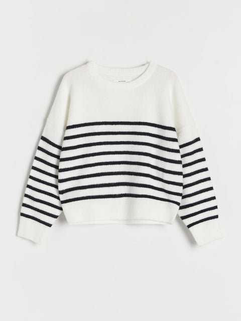 White sweater with black horizontal stripes on a white background