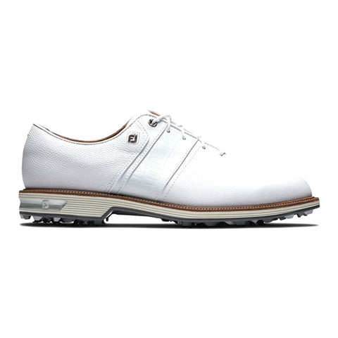 White golf shoe with brown accents on a white background