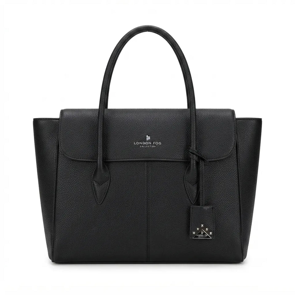 A black pebbled leather tote bag with double top handles, a front flap pocket, and a hanging metal brand tag, shown on a plain white background.