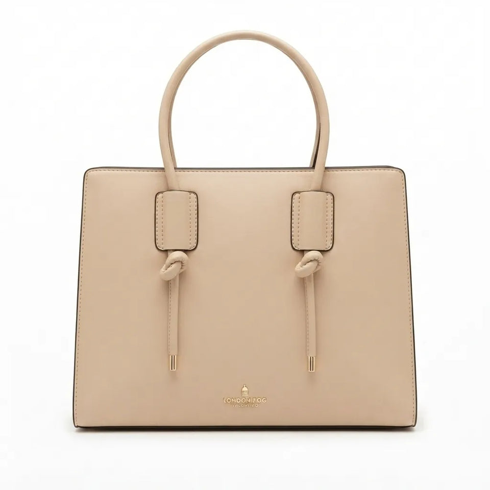 A structured beige leather handbag with double top handles, knotted leather details on the front, and a small gold logo on the lower center, shown against a plain white background.