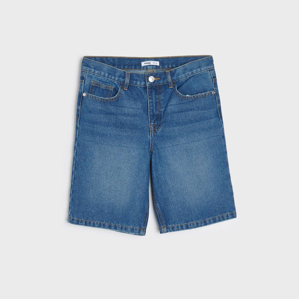 Blue denim shorts on a white background