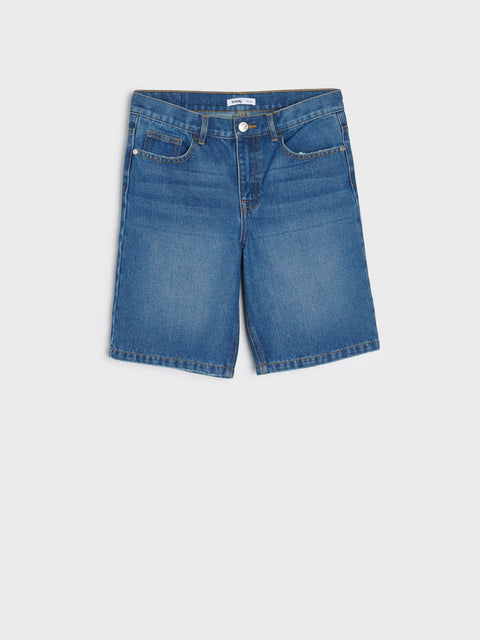 Blue denim shorts on a white background