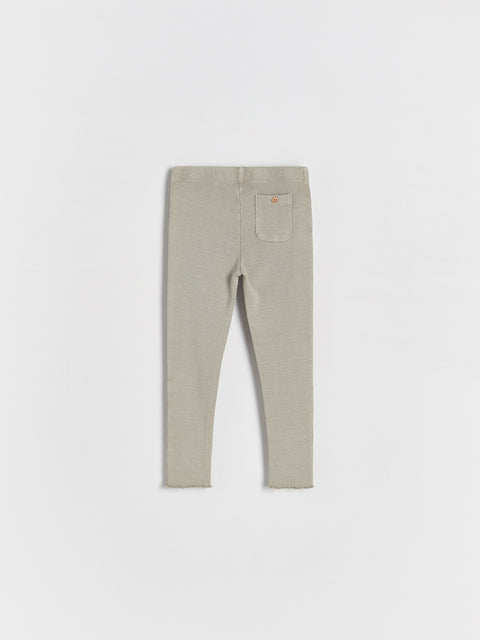 Light gray pants on a white background