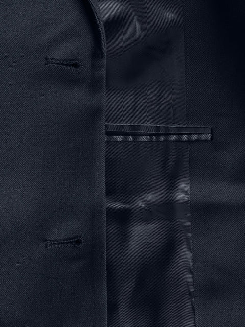 Close-up of a dark fabric texture with a pocket detail