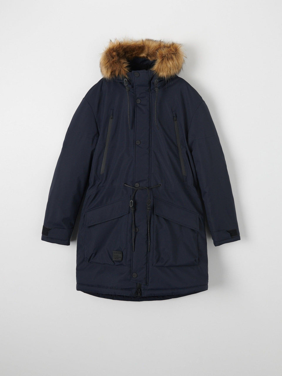 Navy parka coat with fur hood on a light gray background