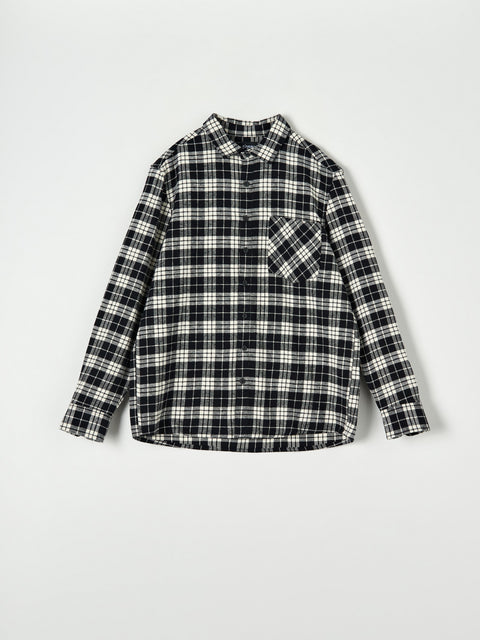 Black and white plaid shirt on a light gray background