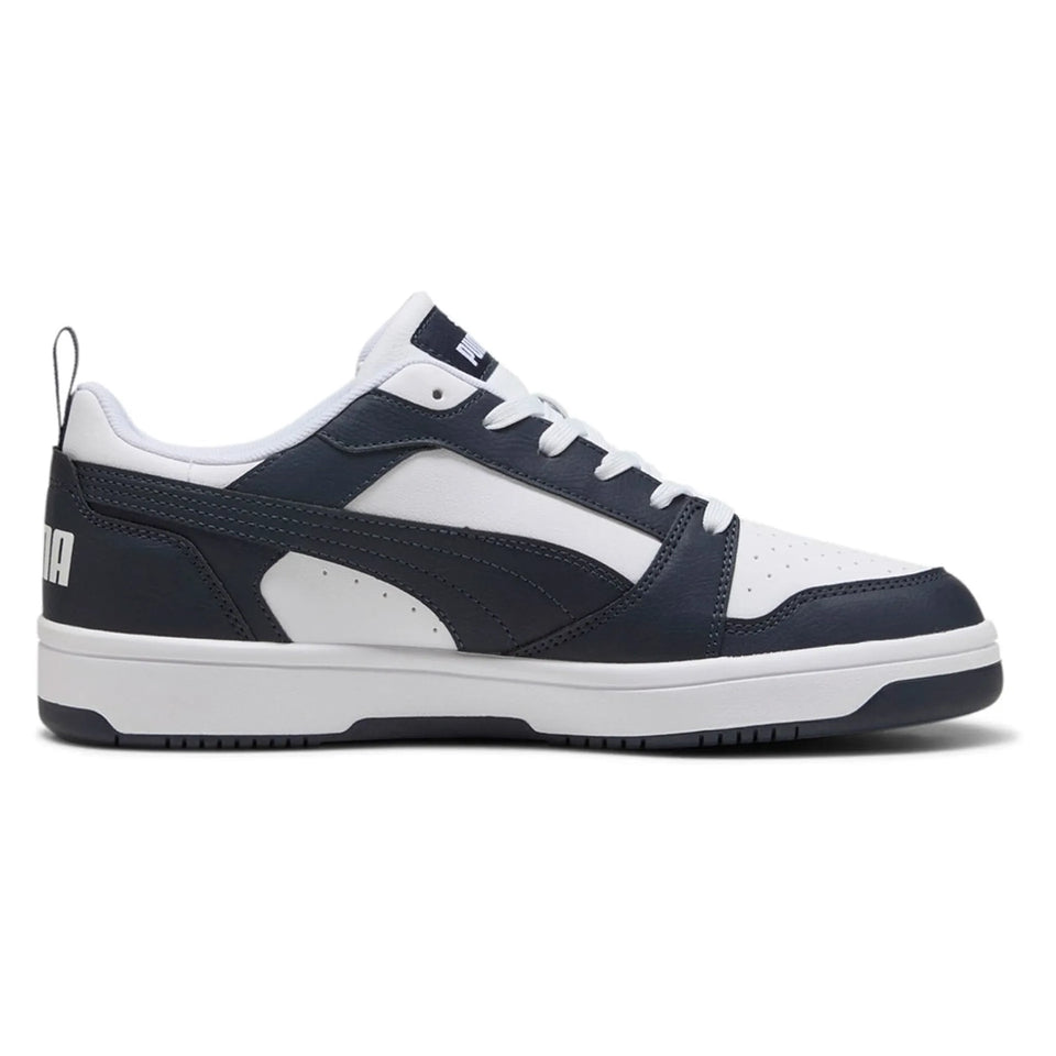 Navy and white sneaker on a white background