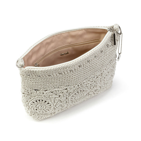 White textured clutch bag with lace detailing on a white background