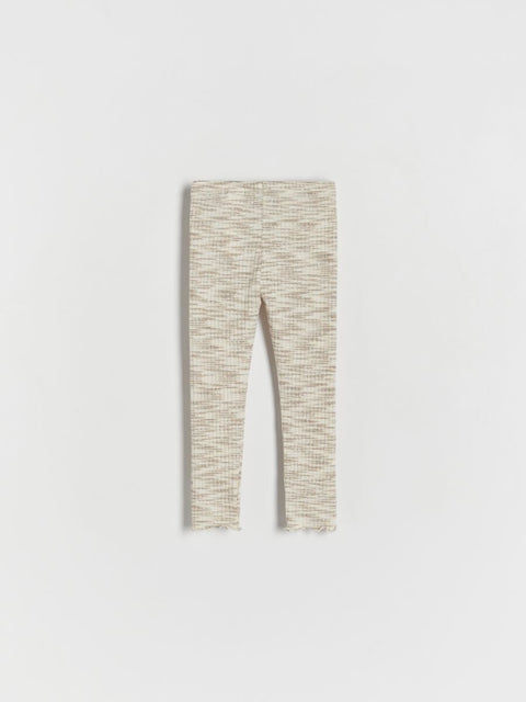 Beige leggings on a white background