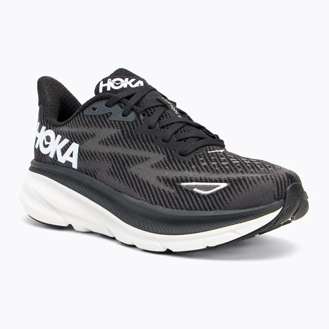 Black running shoe with white sole on a white background