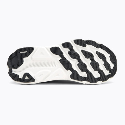 Close-up of a shoe sole with white and black design on a white background