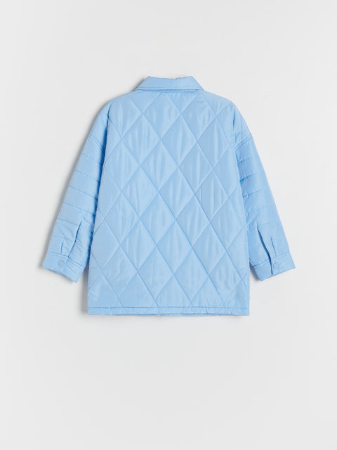 Light blue quilted jacket on a light gray background