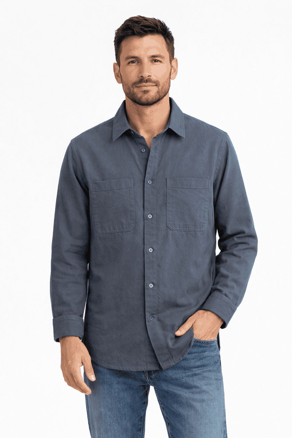 Man wearing a blue shirt with two front pockets on a white background