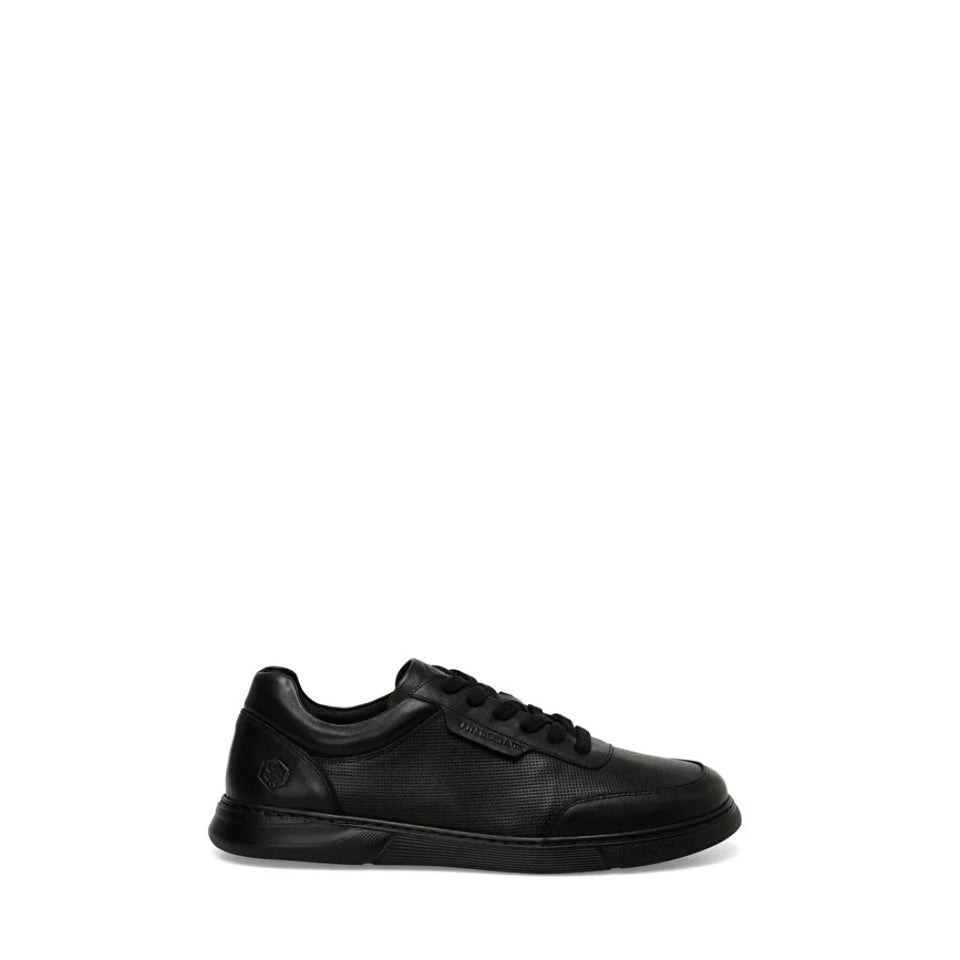 Black sandal with criss-cross straps on a white background