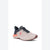 A single women's athletic sneaker shown from a three-quarters angle on a white background. The shoe features a light beige mesh upper, a dark navy blue heel and collar, a coral-pink midsole accent, and a dark brown outsole.