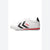 A white low-top sneaker by Hummel, featuring black chevron stripes, a red logo, and a red stripe along the white midsole, shown against a plain white background.