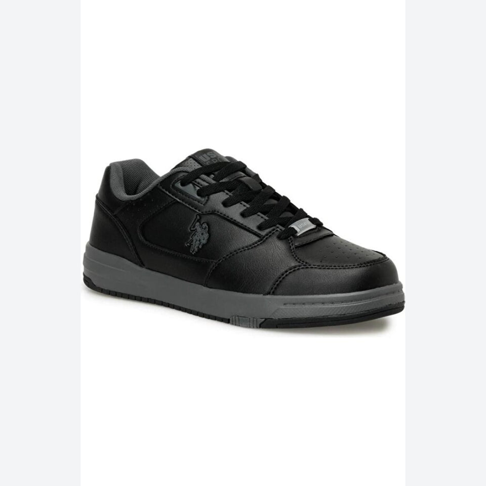 Green sneaker on a white background