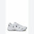 A white athletic sneaker with silver metallic accents and a black embroidered logo, shown from a side profile on a white background.