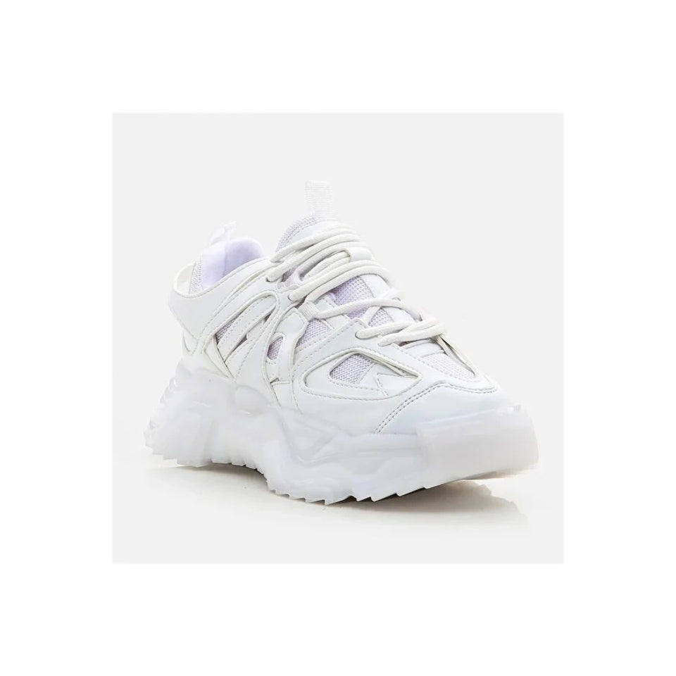 A white chunky platform sneaker with thick laces and a textured sole, shown from a three-quarters angle on a light gray background.