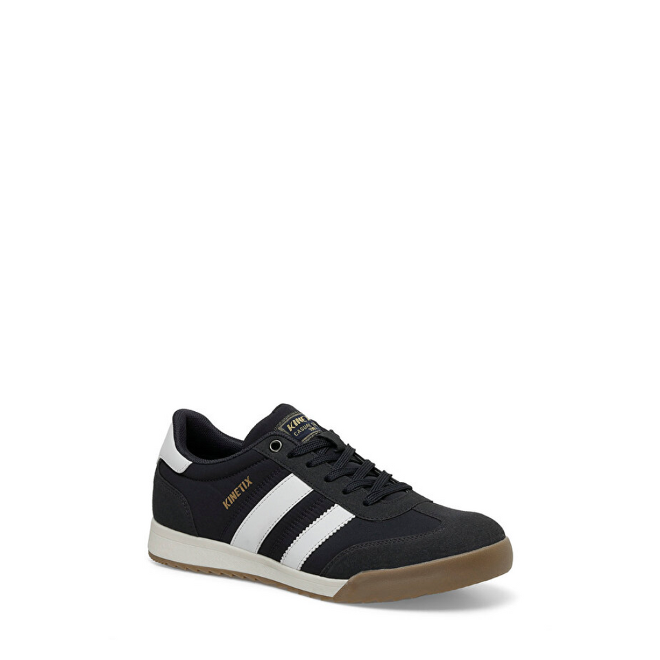 A black low-top sneaker with three white side stripes, a white midsole, and a brown gum sole, shown on a plain white background.