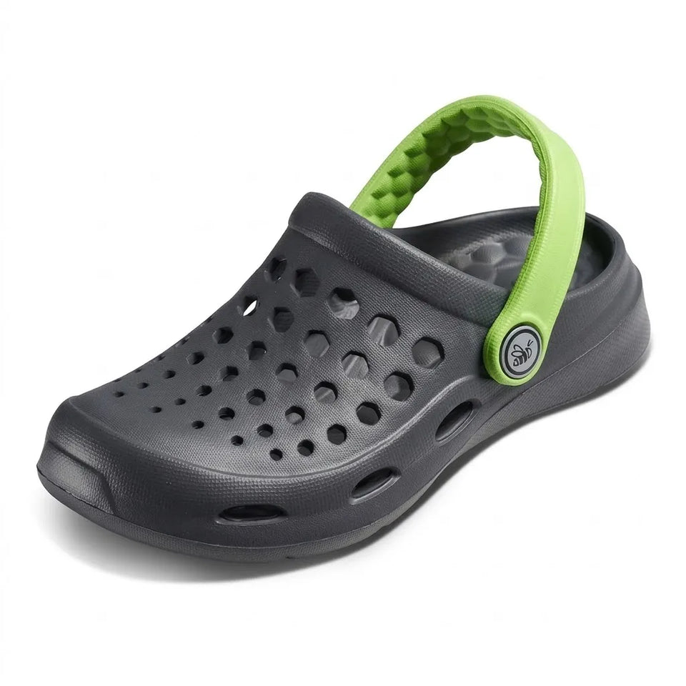 A single dark gray molded clog-style shoe with a bright lime green textured heel strap, shown on a plain white background.