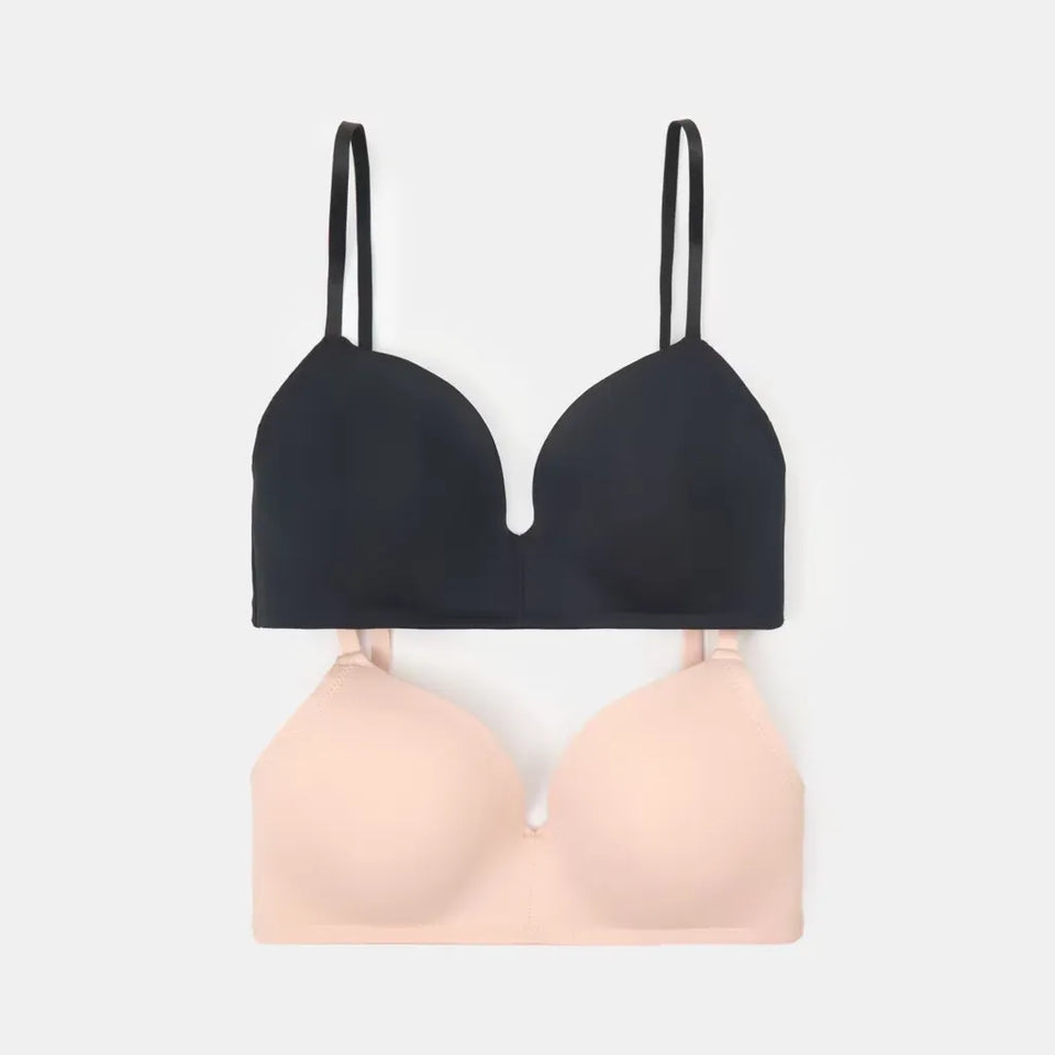 Two wireless underwire bras shown flat against a light gray background, one in solid black and the other in soft blush pink.