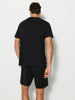 Sinsay Men's Black Muscle Body Graphic T-Shirt and Shorts Set | Sinsay in Lebanon