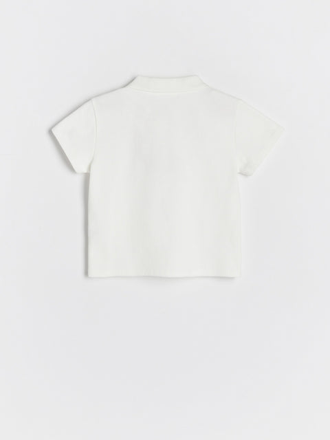 White t-shirt on a light gray background