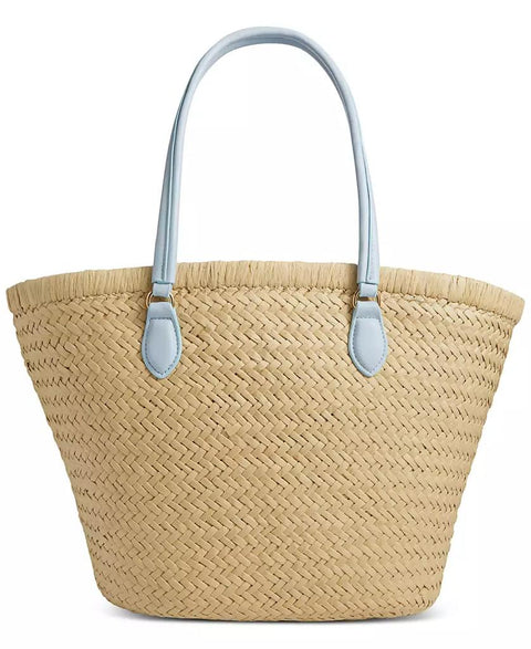 Woven straw tote bag with light blue handles on a white background