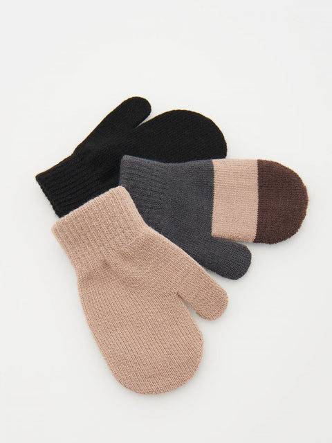 Three pairs of mittens in black, gray, and beige on a white background