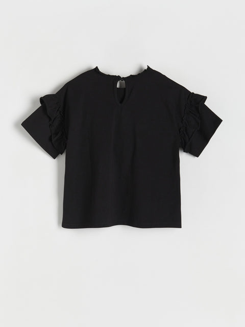 Black blouse with ruffled sleeves on a white background
