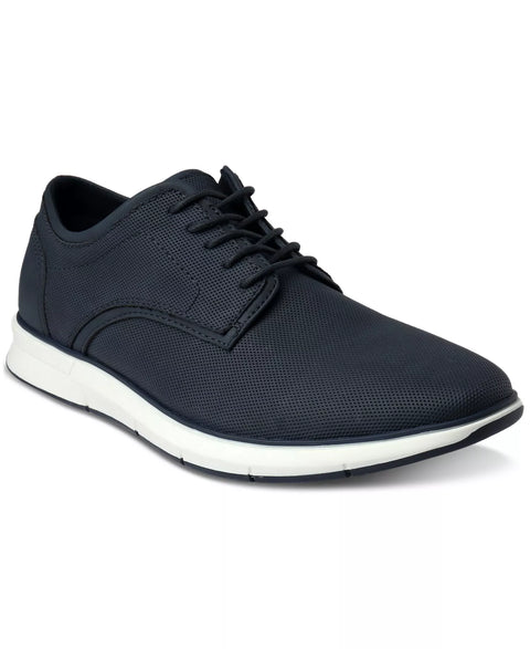 Navy blue casual shoe with white sole on a white background