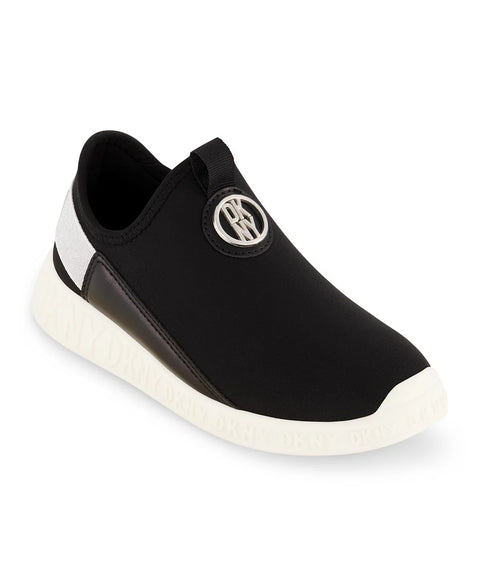 Black slip-on sneaker with a white sole on a white background