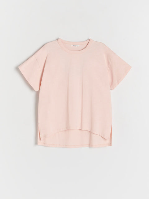 Pink blouse on a light gray background