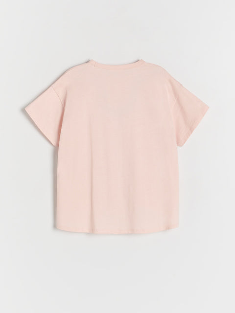 Light pink blouse on a light gray background
