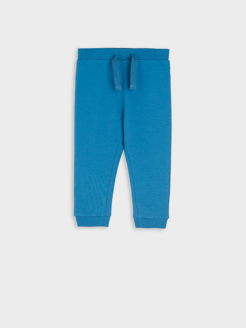 Blue baby pants on a white background