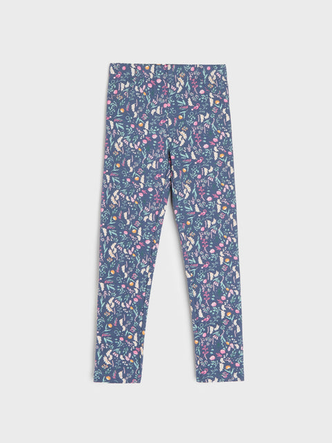Blue leggings with colorful floral pattern on a white background