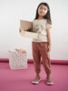 Young girl holding a box with a white background