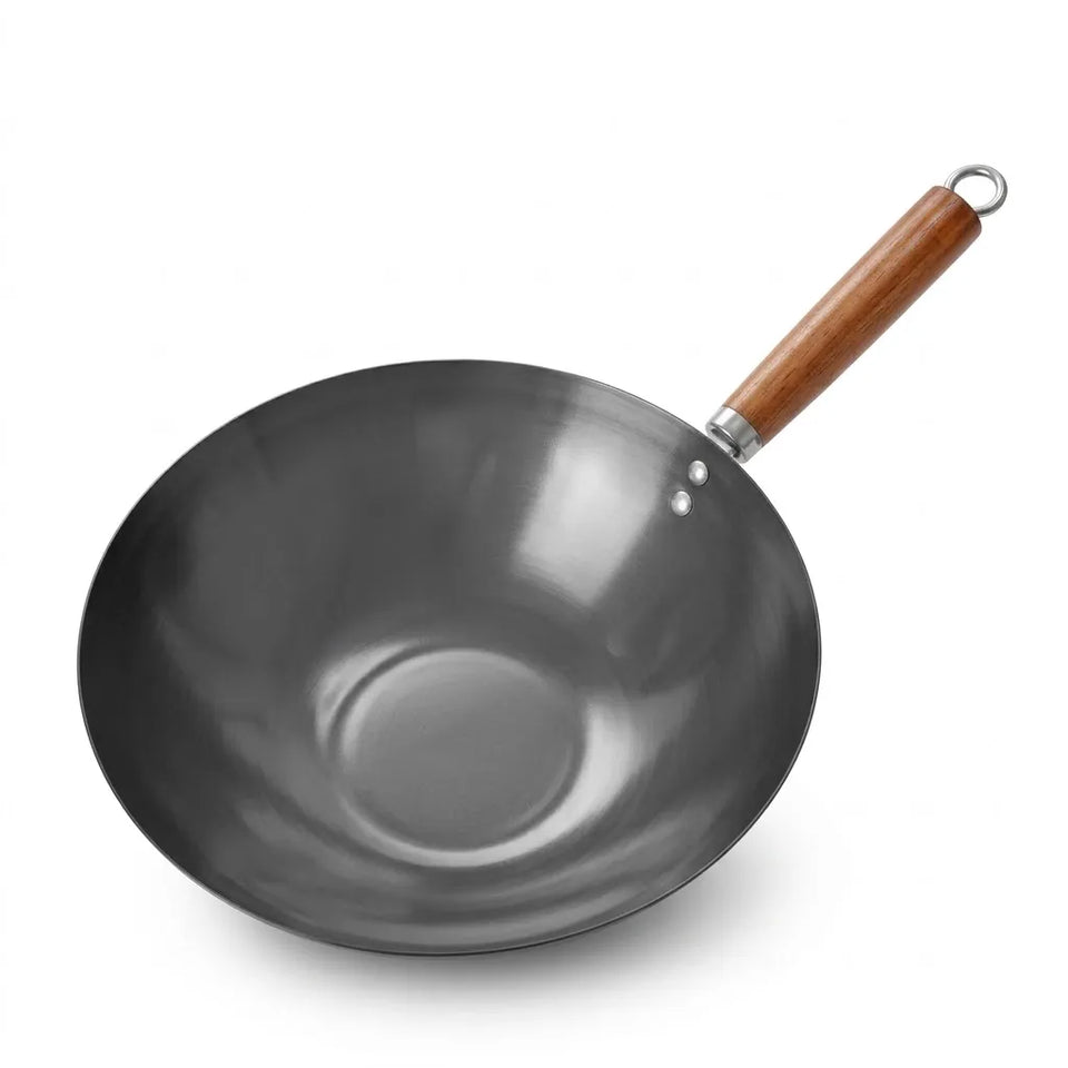 A dark gray cast iron wok with a brown wooden handle and a silver metal loop, shown on a plain white background.