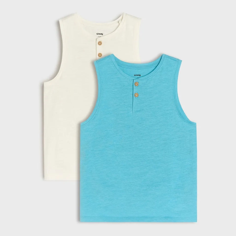 Two sleeveless Henley tank tops for kids, one in bright turquoise blue and one in cream, both with two brown buttons at the collar, displayed on a light gray background.