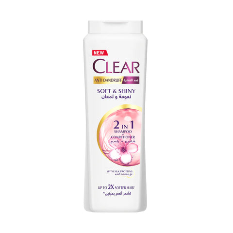 Clear 2 in 1 shampoo and conditioner bottle on a white background